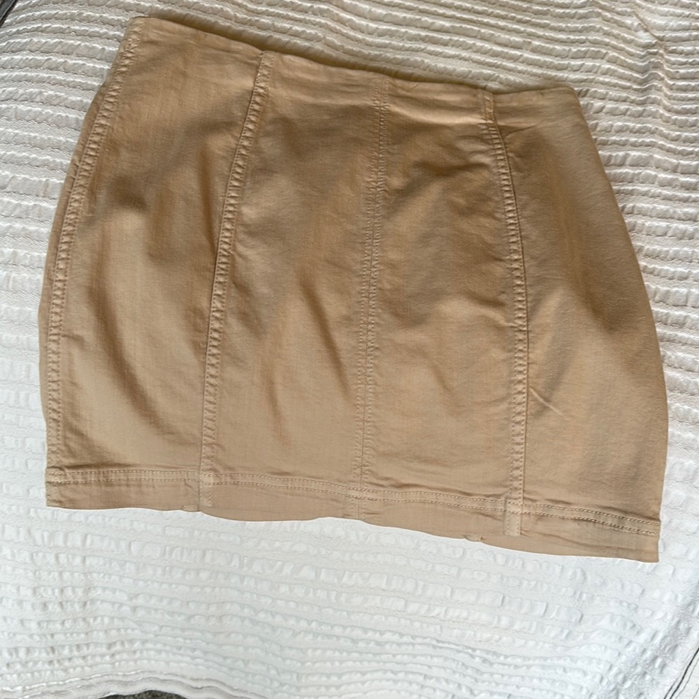 Khaki mini skirt free people size 10. Never worn.